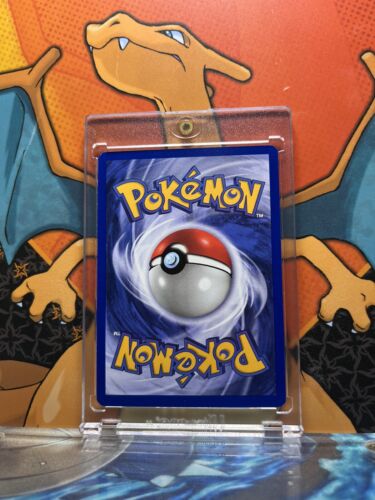 Voltorb Team Rocket 1st Edition NM, 69/82 Pokemon Card.